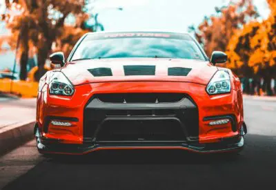 red car near trees