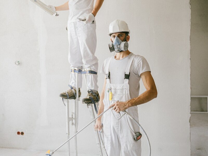 Men Painting a Room