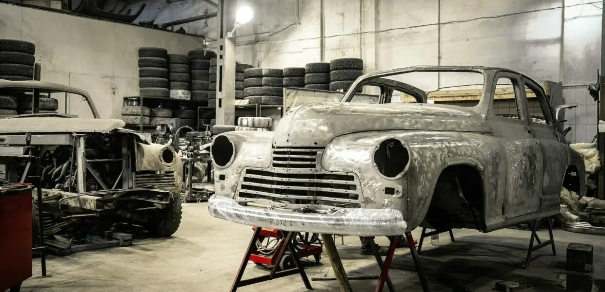 white vintage car in garage